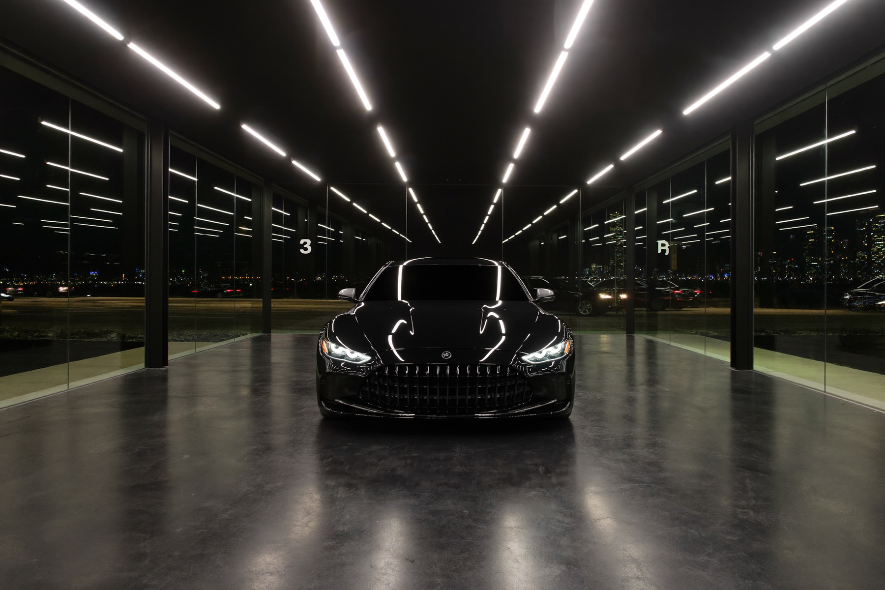Black luxury car in a clean minimal automotive studio where smart tint film is fitted